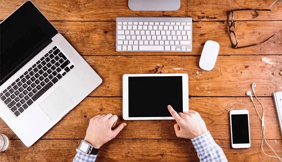 "Sleek laptop and touchscreen tablet with stylus, representing productivity and mobility."