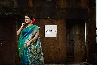 Blue green dual tone pure katan silk Baluchari saree from the Kadambari series Blue green dual tone pure katan silk Baluchari saree from the Kadambari series