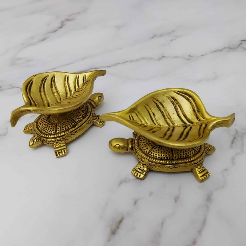 Brass Tortoise Pipal Leaf Diya Pair - 1.5 inch Height | Symbol of Stability and Fortune Brass Tortoise Pipal Leaf Diya Pair - 1.5 inch Height | Symbol of Stability and Fortune