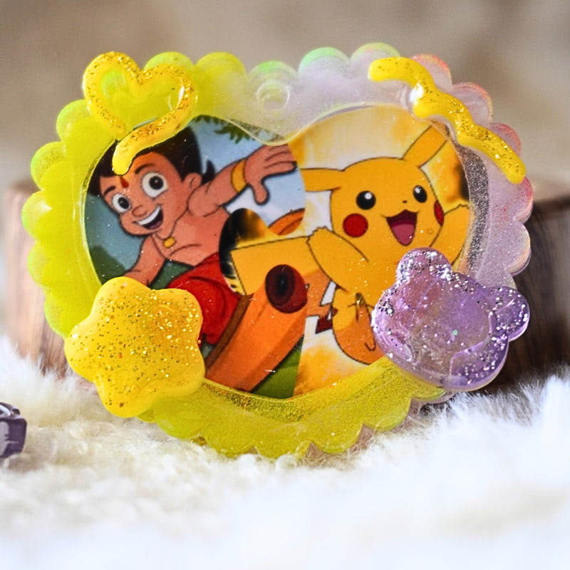 PIKACHU AND CHOTTA BHEEM IN ONE HEART PHOTO FRAME KEYCHAIN PIKACHU AND CHOTTA BHEEM IN ONE HEART PHOTO FRAME KEYCHAIN