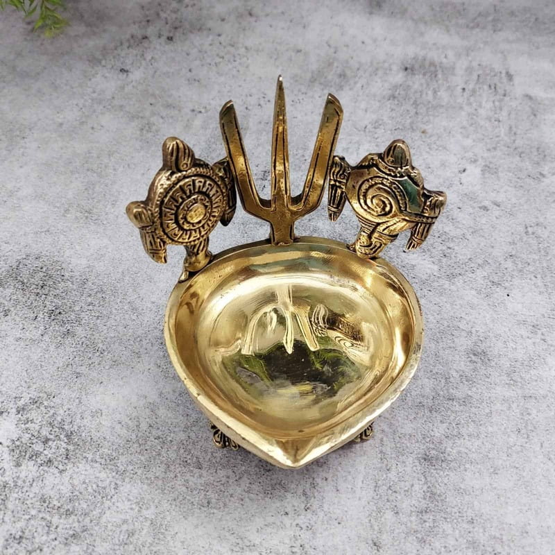 Brass Shank Chakra Namah Diya - 4.8 inch Height | Auspicious Brass Diya with Shank and Chakra Design Brass Shank Chakra Namah Diya - 4.8 inch Height | Auspicious Brass Diya with Shank and Chakra Design