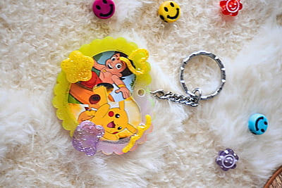 PIKACHU AND CHOTTA BHEEM IN ONE HEART PHOTO FRAME KEYCHAIN PIKACHU AND CHOTTA BHEEM IN ONE HEART PHOTO FRAME KEYCHAIN