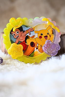 PIKACHU AND CHOTTA BHEEM IN ONE HEART PHOTO FRAME KEYCHAIN PIKACHU AND CHOTTA BHEEM IN ONE HEART PHOTO FRAME KEYCHAIN