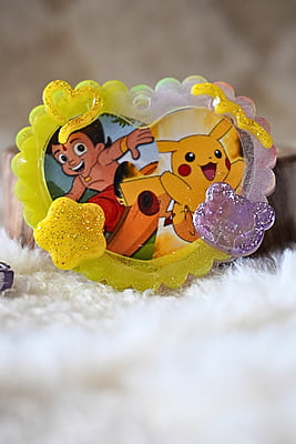 PIKACHU AND CHOTTA BHEEM IN ONE HEART PHOTO FRAME KEYCHAIN PIKACHU AND CHOTTA BHEEM IN ONE HEART PHOTO FRAME KEYCHAIN