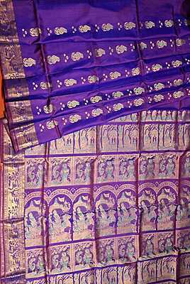 Rani pink and purple dual tone colour with golden colour zari Figure motif Swarnachari saree Rani pink and purple dual tone colour with golden colour zari Figure motif Swarnachari saree