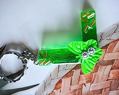 'L' LETTER FEATHER BUTTERFLY KEYCHAIN