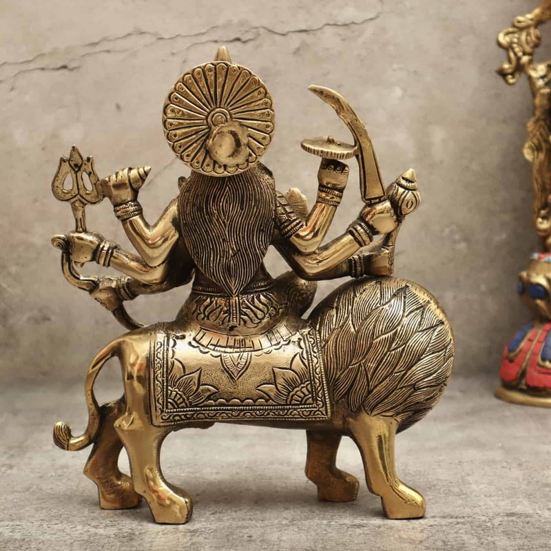 Brass Goddess Durga Maa on Lion for Home Temple - 9.5 inch Height | Graceful Brass Idol of Goddess Durga Maa on Lion for Sacred Devotion Brass Goddess Durga Maa on Lion for Home Temple - 9.5 inch Height | Graceful Brass Idol of Goddess Durga Maa on Lion for Sacred Devotion