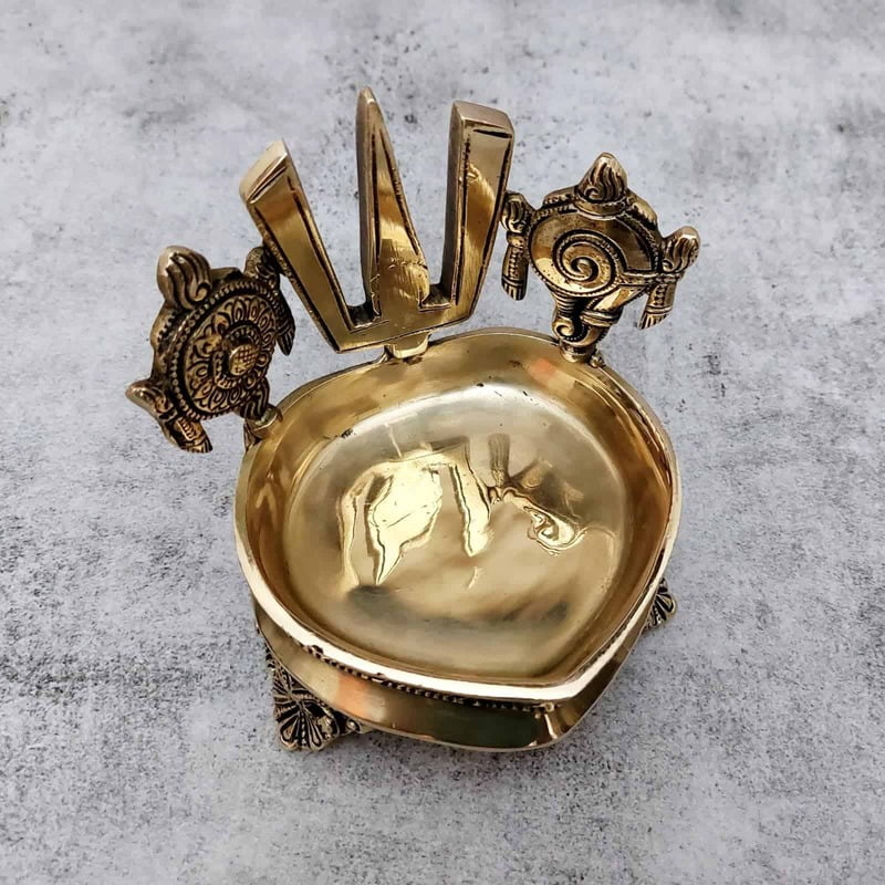 Brass Shank Chakra Nama Diya - 5.8 inch Height | Sacred Brass Diya with Shankh and Chakra Design Brass Shank Chakra Nama Diya - 5.8 inch Height | Sacred Brass Diya with Shankh and Chakra Design