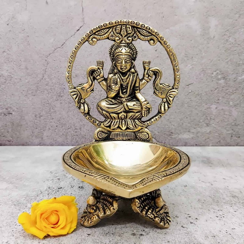 Brass Gaja Lakshmi Diya - 6 inch Height | Brass Diya with Gaja Lakshmi Design Brass Gaja Lakshmi Diya - 6 inch Height | Brass Diya with Gaja Lakshmi Design