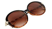 Female Oversized Round Sunglasses. Tortoise Print Rim Female Oversized Round Sunglasses. Tortoise Print Rim