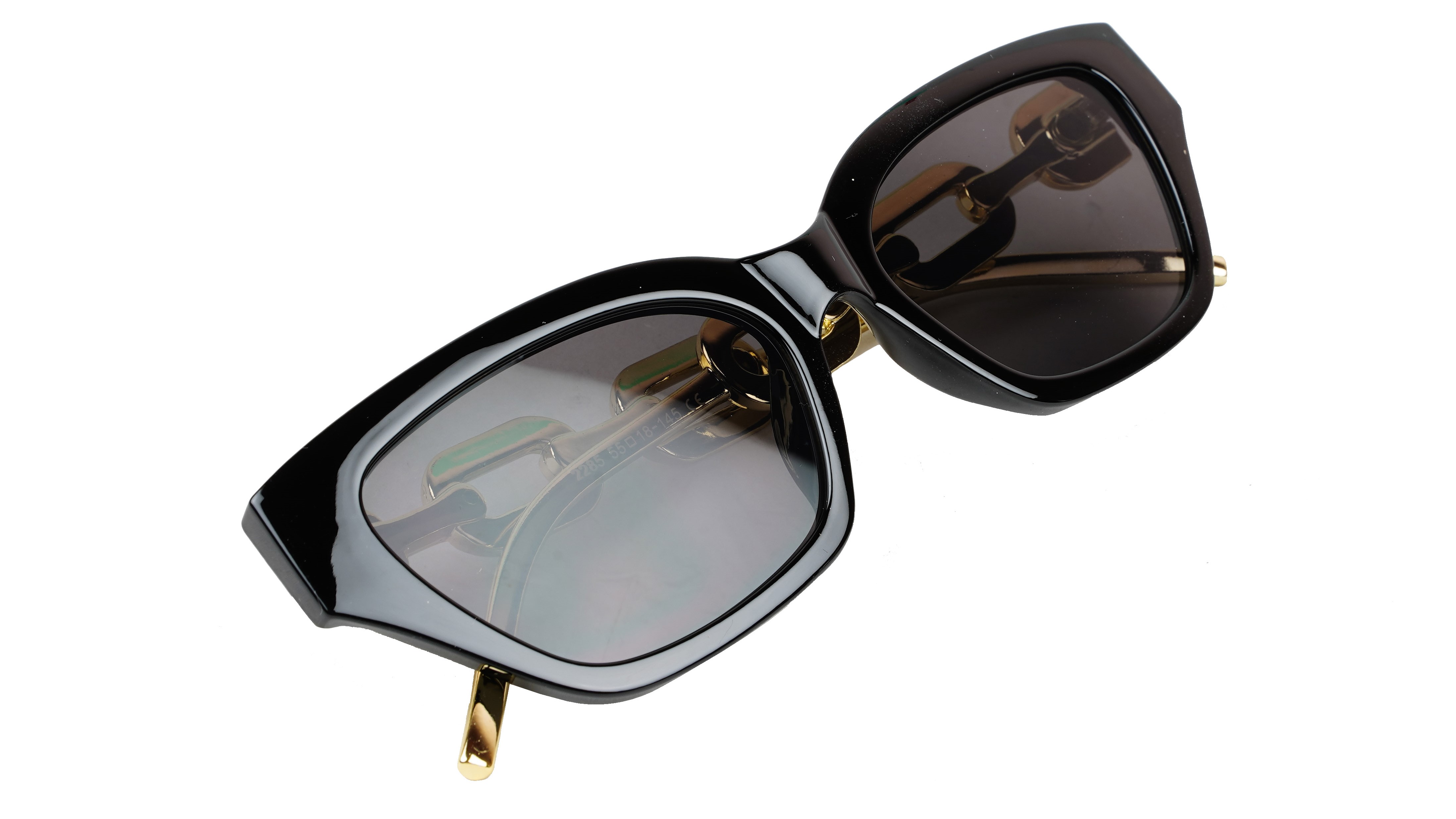 Female Large Cat Eye Sunglass. Black Rim. Golden Temple.