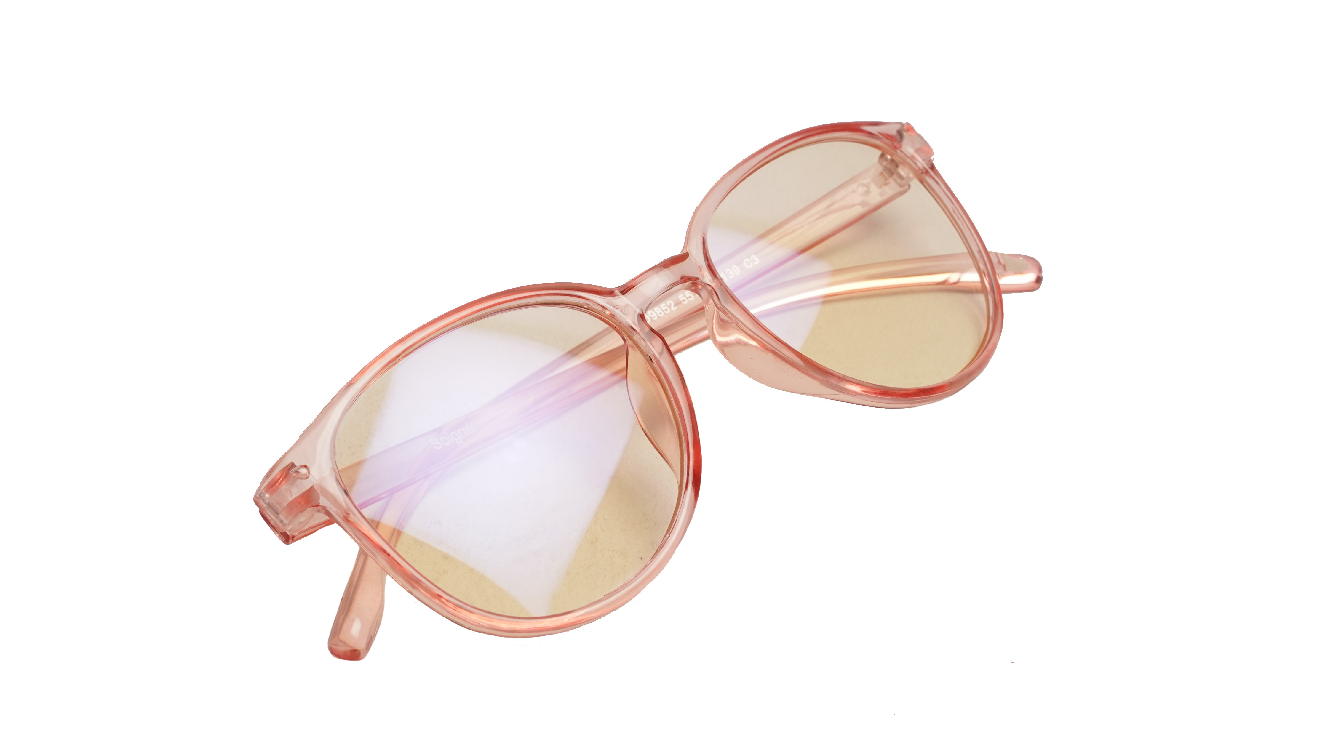 Soigné Female Round Large Spectacle Frame. See Through Pink