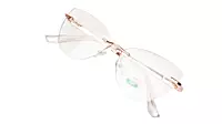 Soigné Female Large Rimless Cat Eye Spectacle Frame.Gold&Transparent