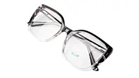 Soigné Female Oversized Cat Eye Spectacle Frame.Black&Transparent Color