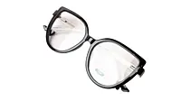 Soigné Female Oversized Cat Eye Spectacle Frame.Black Rim&Transparent Temples