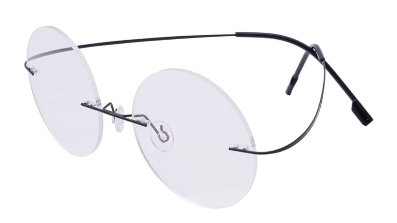 Unisex Rimless Round Flexible Spectacle Frame. Black Color Metal Frame. Unisex Rimless Round Flexible Spectacle Frame. Black Color Metal Frame.