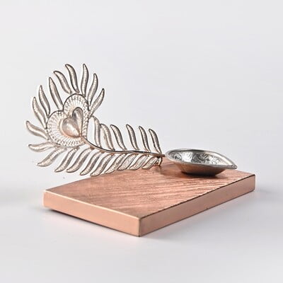 Exquisite Peacock feather diya Exquisite Peacock feather diya