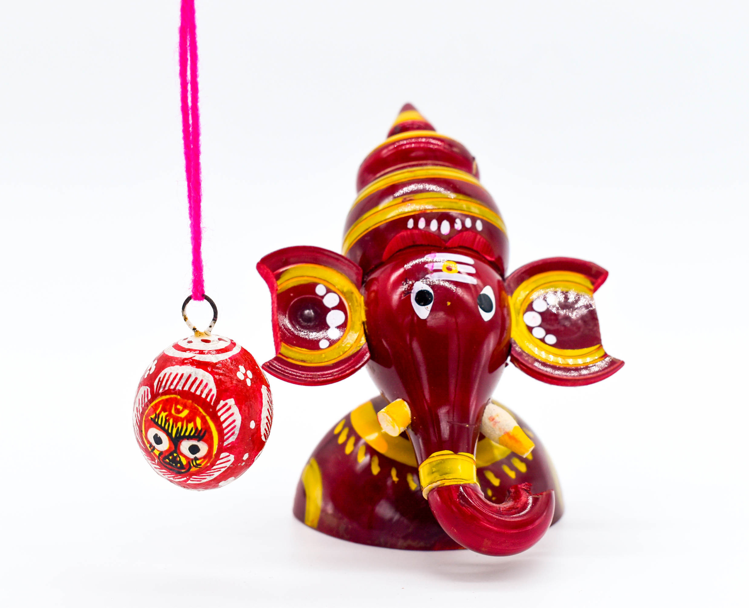 Handcrafted Indian Car Dashboard Ganesh Figurine with Jagannath Hanging Ornament on Beetle nut, multicolored