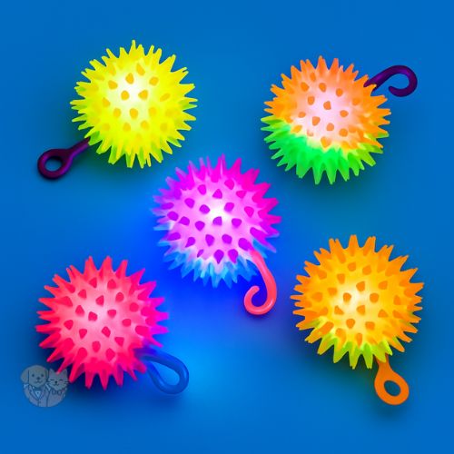 FUN LED Spike Ball โ Flashing, Bouncy & Squeaky Toy for Dogs & Cats FUN LED Spike Ball โ Flashing, Bouncy & Squeaky Toy for Dogs & Cats