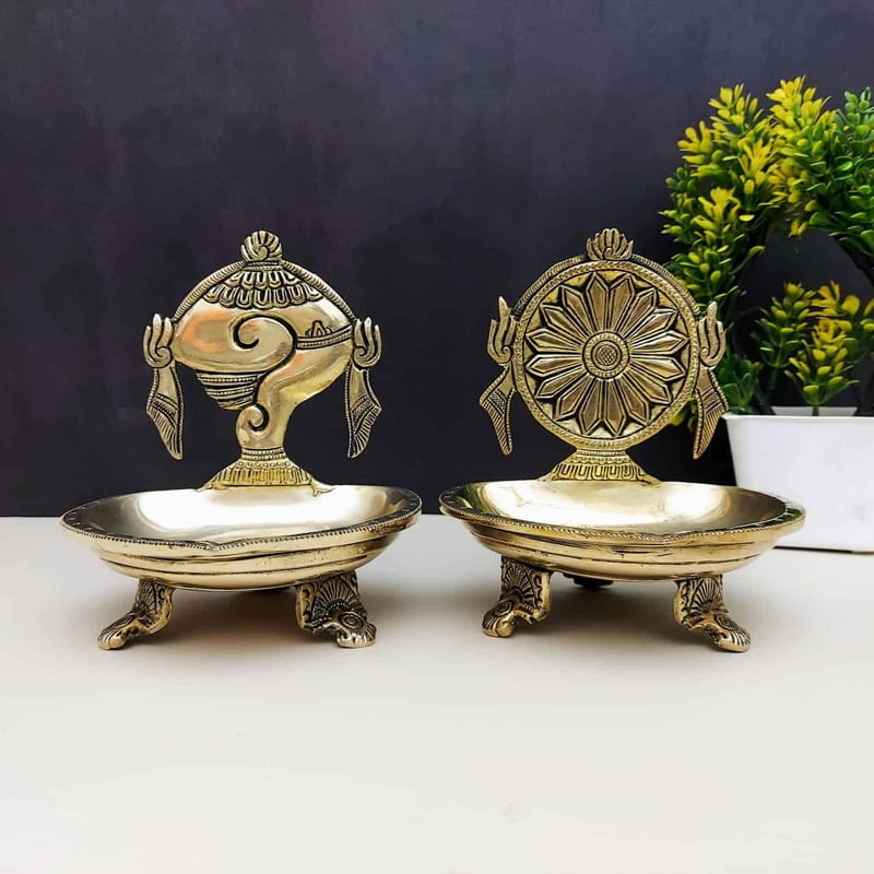 Brass Shankh Chakra Diya Set of Two - 6 inch Height | Traditional Brass Diya Set with Shankh and Chakra Design Brass Shankh Chakra Diya Set of Two - 6 inch Height | Traditional Brass Diya Set with Shankh and Chakra Design