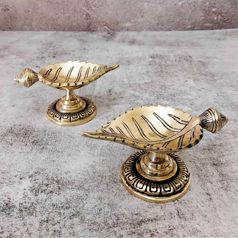 Brass Leaf Diya - 2.7 inch Height | Intricate Brass Leaf-shaped Diya for Lighting Brass Leaf Diya - 2.7 inch Height | Intricate Brass Leaf-shaped Diya for Lighting