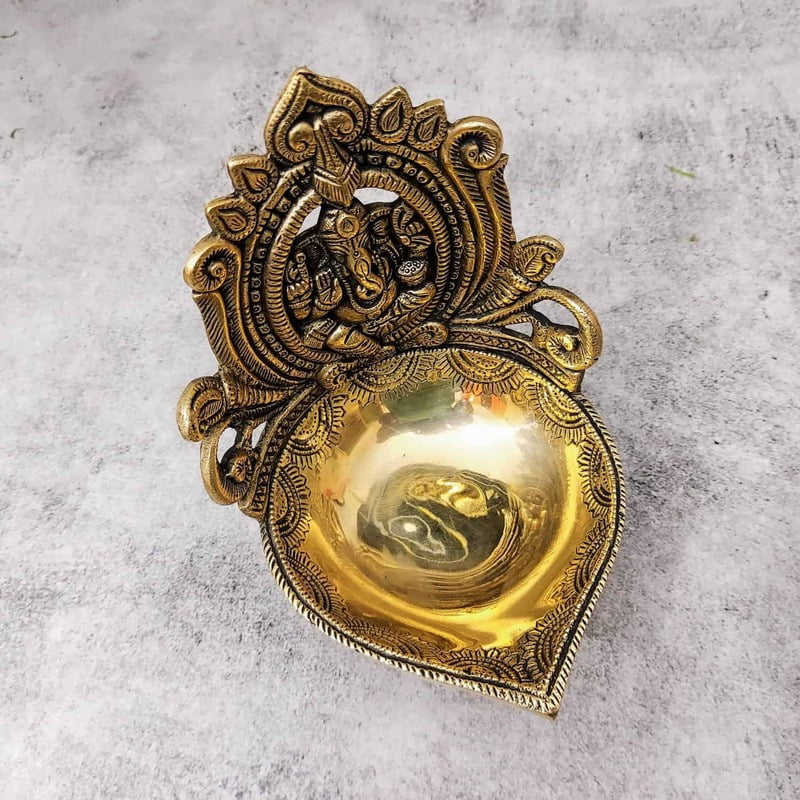 Brass Ganesh Akhand Diya - 7 inch Height | Decorative Brass Ganesh Akhand Diya for Rituals - Buy Online Brass Ganesh Akhand Diya - 7 inch Height | Decorative Brass Ganesh Akhand Diya for Rituals - Buy Online