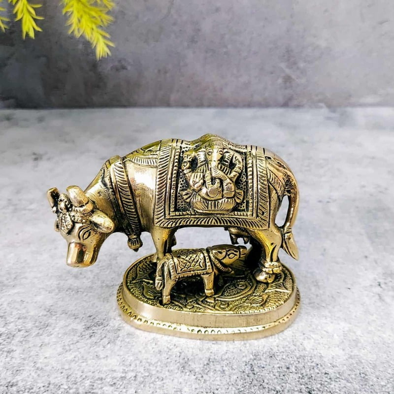 Brass Lakshmi Ganesh Kamadhenu / Cow and Calf - 3 inch Height | Divine Brass Lakshmi Ganesh Kamadhenu / Cow and Calf Idol - Shop Now Brass Lakshmi Ganesh Kamadhenu / Cow and Calf - 3 inch Height | Divine Brass Lakshmi Ganesh Kamadhenu / Cow and Calf Idol - Shop Now