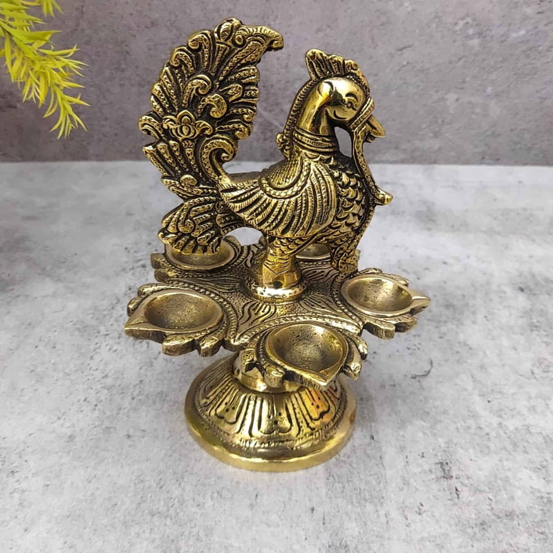 Brass Peacock Five Wick Diya - 6.5 inch Height | Brass Diya with Peacock Design for Festivals Brass Peacock Five Wick Diya - 6.5 inch Height | Brass Diya with Peacock Design for Festivals
