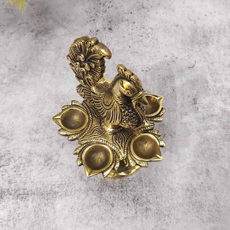 Brass Peacock Five Wick Diya - 6.5 inch Height | Brass Diya with Peacock Design for Festivals Brass Peacock Five Wick Diya - 6.5 inch Height | Brass Diya with Peacock Design for Festivals
