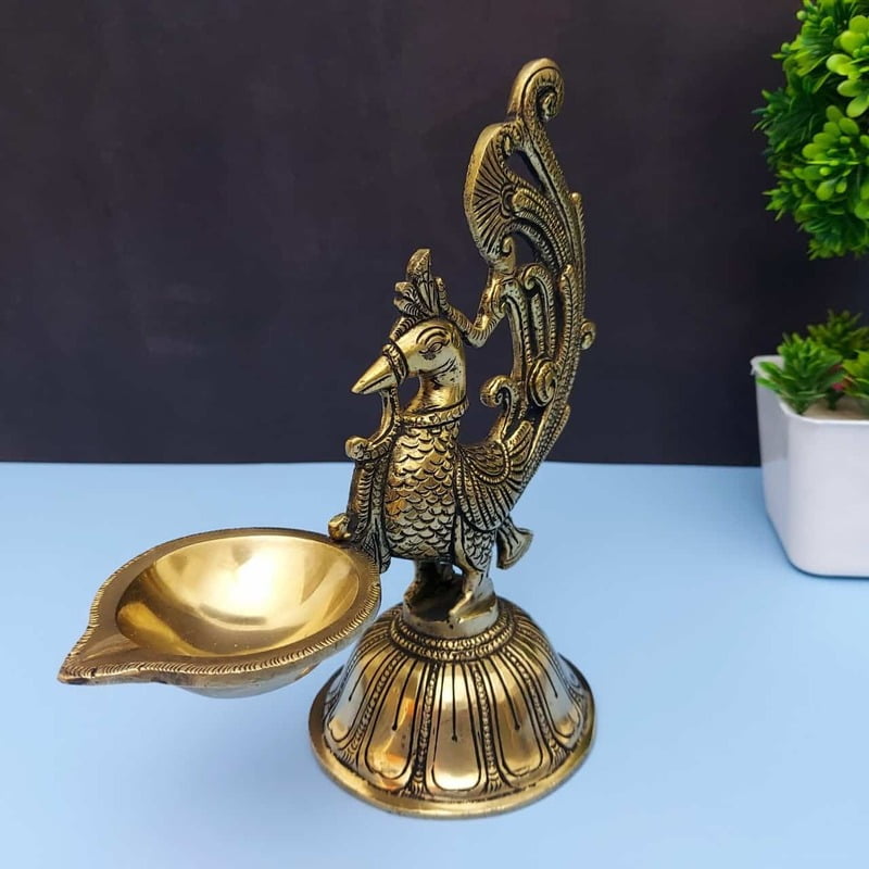 Brass Peacock Single Wick Diya - 7.5 inch Height | Elegant Brass Diya for Spiritual Lighting Brass Peacock Single Wick Diya - 7.5 inch Height | Elegant Brass Diya for Spiritual Lighting