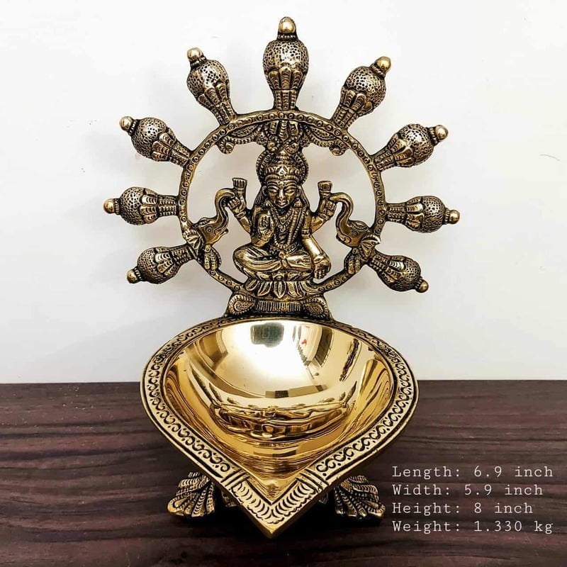 Brass Gaja Lakshmi Diya - 8 inch Height - 8.2 inch Height | Decorative Brass Diya with Gaja Lakshmi Design Brass Gaja Lakshmi Diya - 8 inch Height - 8.2 inch Height | Decorative Brass Diya with Gaja Lakshmi Design