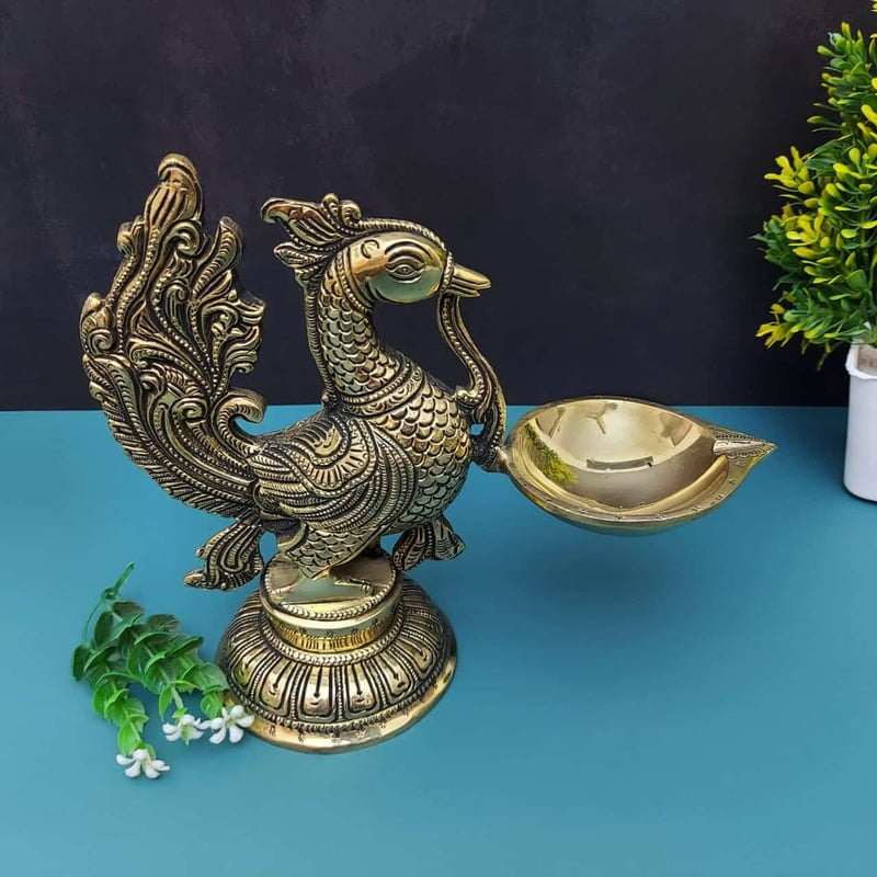 Brass Peacock Single Wick Diya - 7.5" Height | Exquisite Brass Diya with Peacock Design Brass Peacock Single Wick Diya - 7.5" Height | Exquisite Brass Diya with Peacock Design