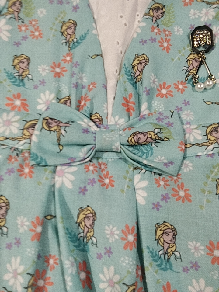Girlsโ Cartoon Character Printed Frock โ Sky Blue with Puff Sleeves & Bow D.13.1356 B.1556 Girlsโ Cartoon Character Printed Frock โ Sky Blue with Puff Sleeves & Bow D.13.1356 B.1556