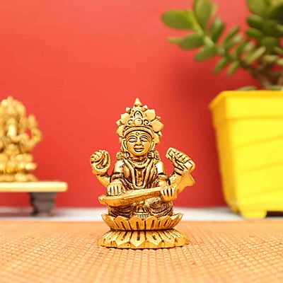 Auspicious Saraswati Devi Idol sitting on Lotus in Brass - 3 inch Height