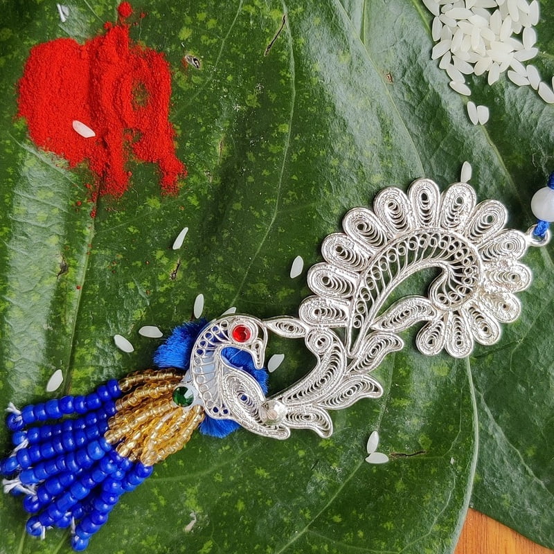 Silver Peacock Lumba Rakhi Silver Peacock Lumba Rakhi