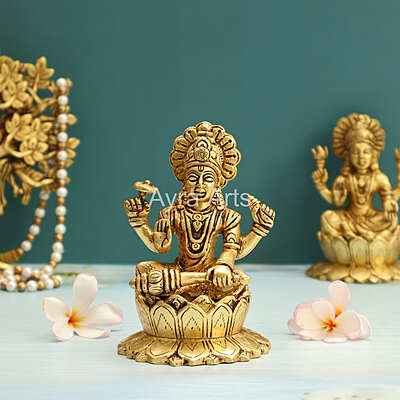 Lord Vishnu Murthi Seated on Lotus In Brass - 5.2 Inch Height Lord Vishnu Murthi Seated on Lotus In Brass - 5.2 Inch Height