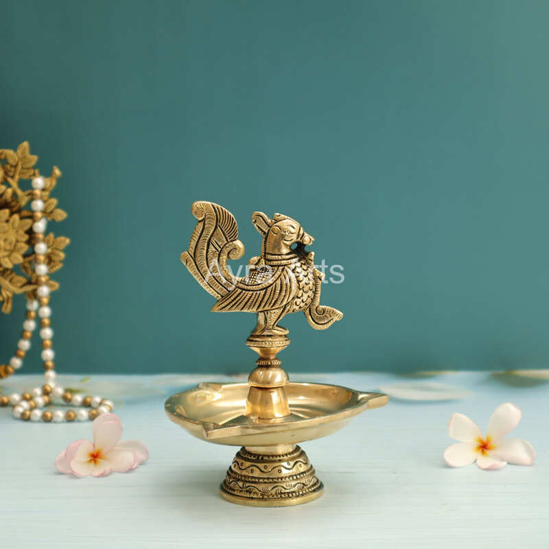 Ethnic Design Brass Three Wick Peacock Diya - 6 Inch Height Ethnic Design Brass Three Wick Peacock Diya - 6 Inch Height