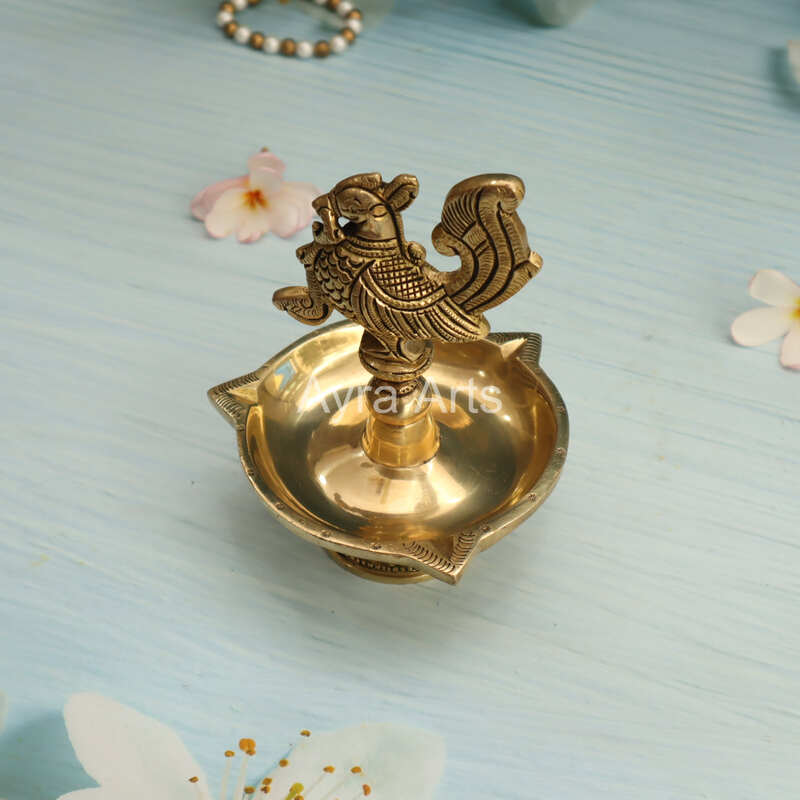 Ethnic Design Brass Three Wick Peacock Diya - 6 Inch Height Ethnic Design Brass Three Wick Peacock Diya - 6 Inch Height