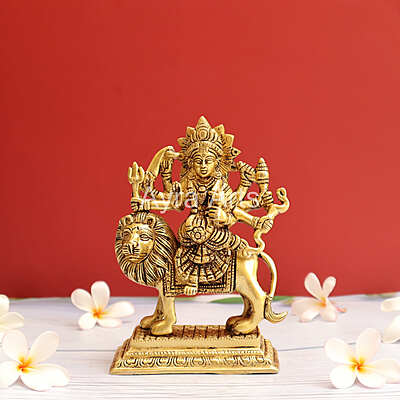 Handcrafted Goddess Durga idol in Pure Brass Devi Maa Sitting On The Lion - 7 Inch Height