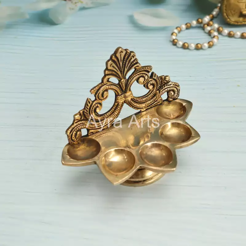 Decorative Five Wick Handmade Diya in Brass - 5 Inch Length Decorative Five Wick Handmade Diya in Brass - 5 Inch Length