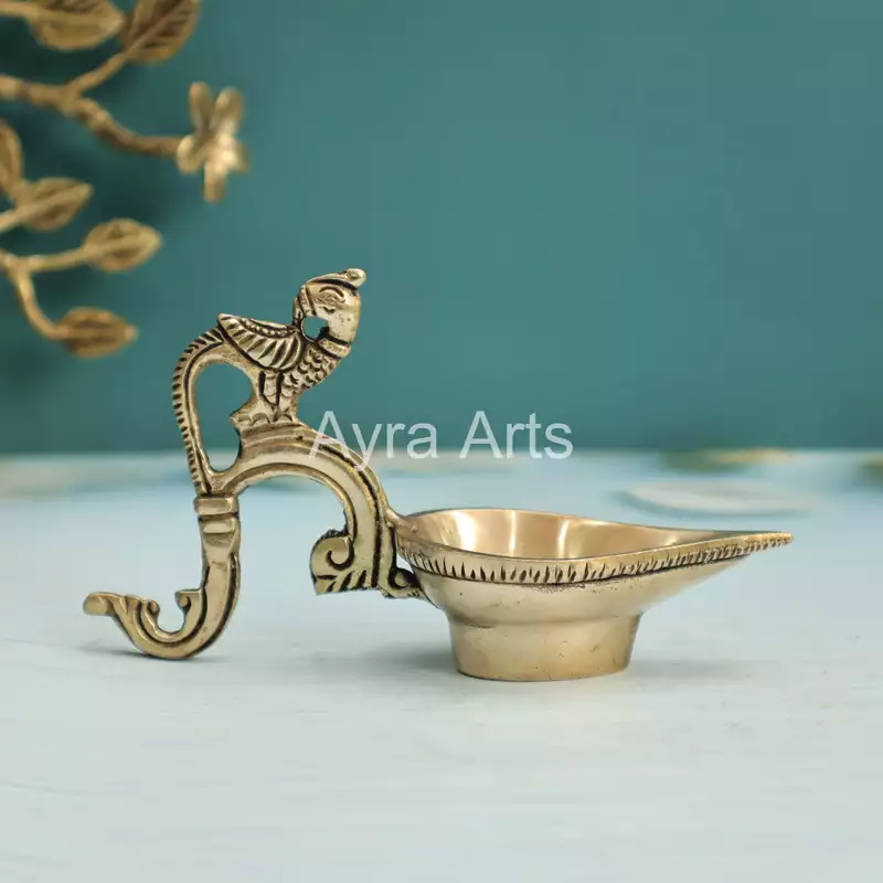 Ek Aarti Brass Bird Diya - 3.2 inch Height | Decorative Brass Diya with Bird Design Ek Aarti Brass Bird Diya - 3.2 inch Height | Decorative Brass Diya with Bird Design