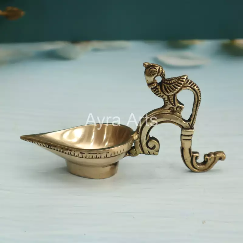 Ek Aarti Brass Bird Diya - 3.2 inch Height | Decorative Brass Diya with Bird Design Ek Aarti Brass Bird Diya - 3.2 inch Height | Decorative Brass Diya with Bird Design