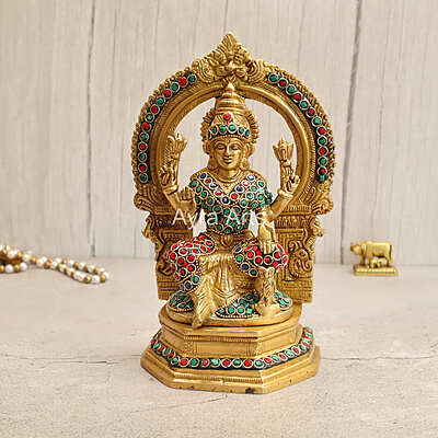 Brass Goddess Lakshmi Seated on Singhasan with Arch in Stonework - 9.5 Inch Height