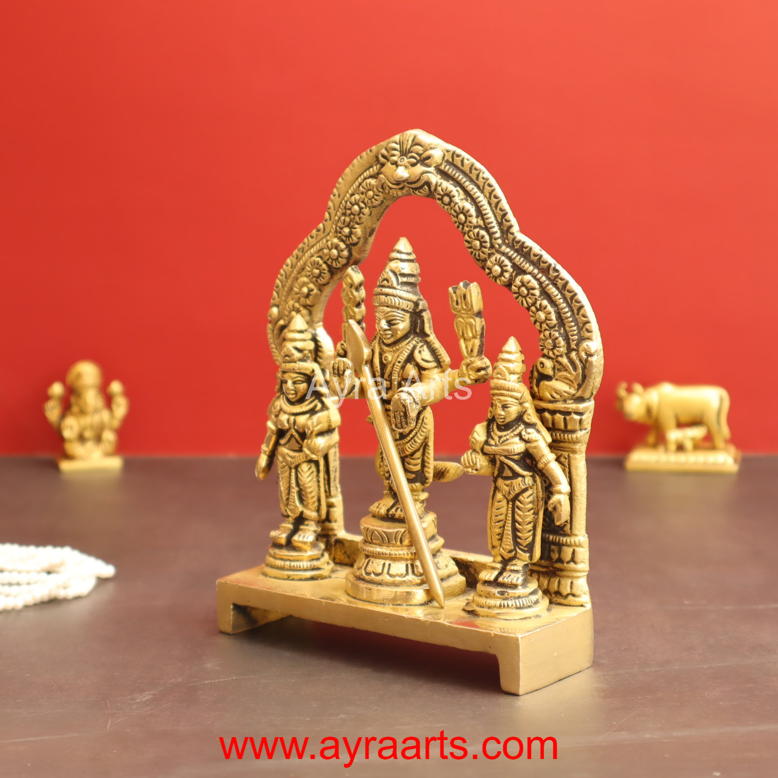 Valli Devasena Sameta Sri Subrahmanya Swamy Brass Idols with Arch - 6 inch Height Valli Devasena Sameta Sri Subrahmanya Swamy Brass Idols with Arch - 6 inch Height