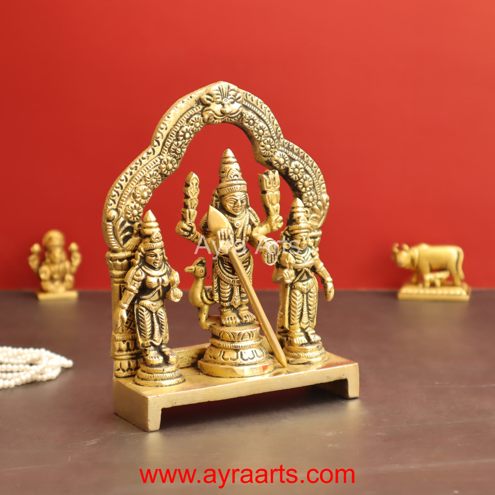 Valli Devasena Sameta Sri Subrahmanya Swamy Brass Idols with Arch - 6 inch Height Valli Devasena Sameta Sri Subrahmanya Swamy Brass Idols with Arch - 6 inch Height