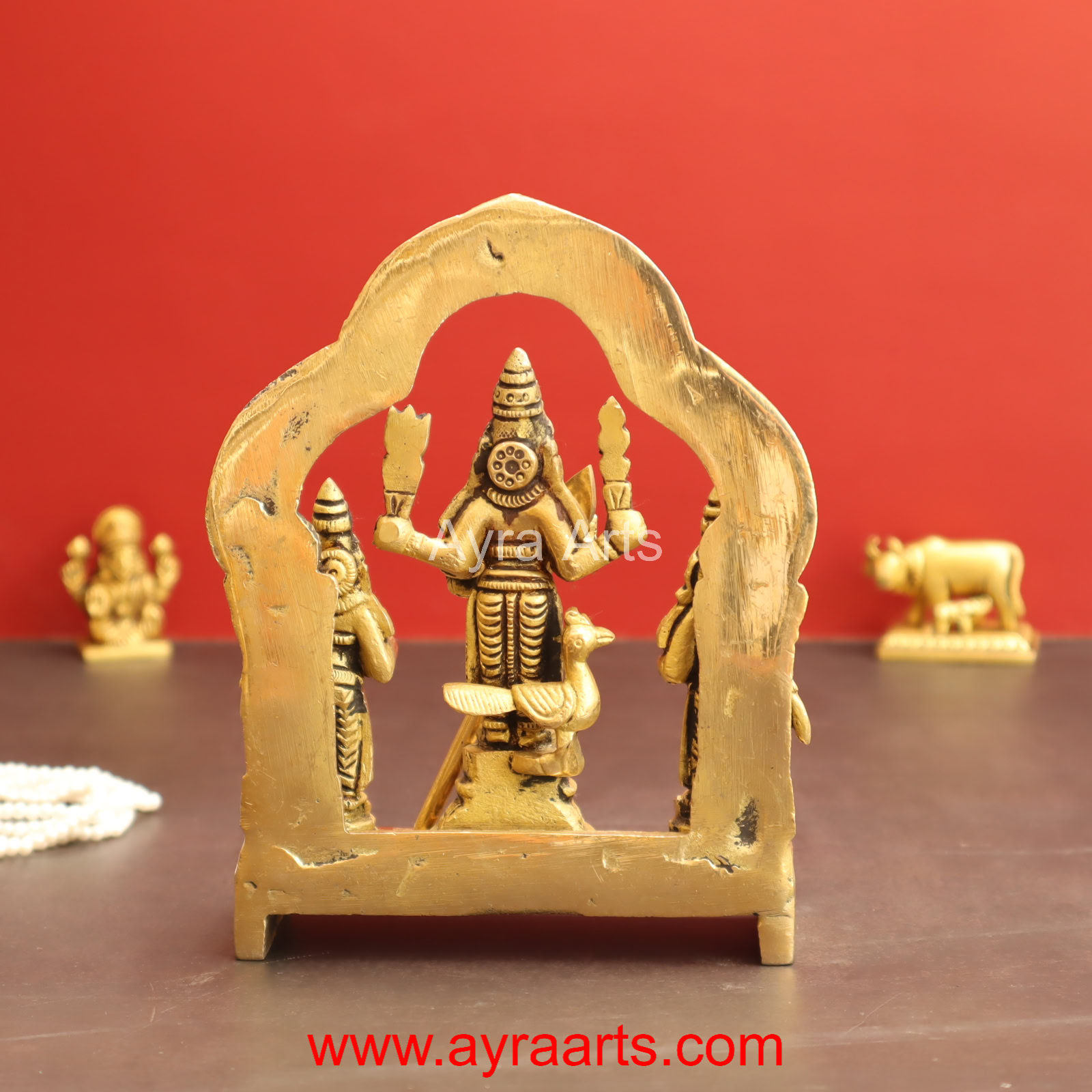 Valli Devasena Sameta Sri Subrahmanya Swamy Brass Idols with Arch - 6 inch Height Valli Devasena Sameta Sri Subrahmanya Swamy Brass Idols with Arch - 6 inch Height