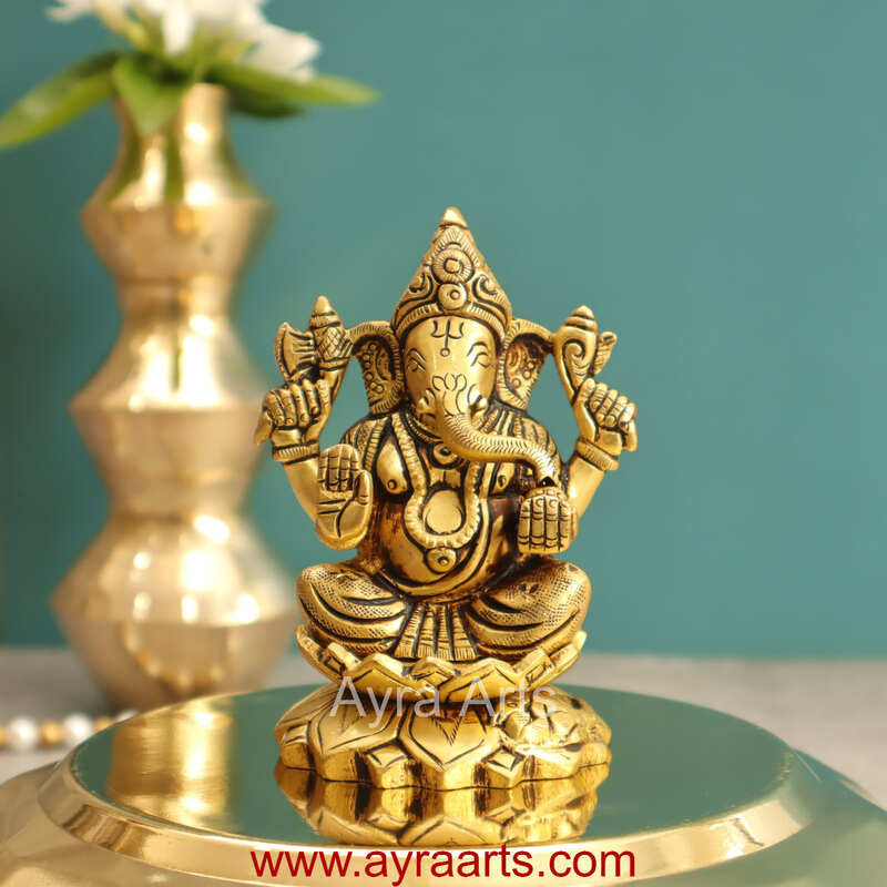 Brass Fine Art Ganesha Sitting On Lotus Base - 4 Inch Height Brass Fine Art Ganesha Sitting On Lotus Base - 4 Inch Height