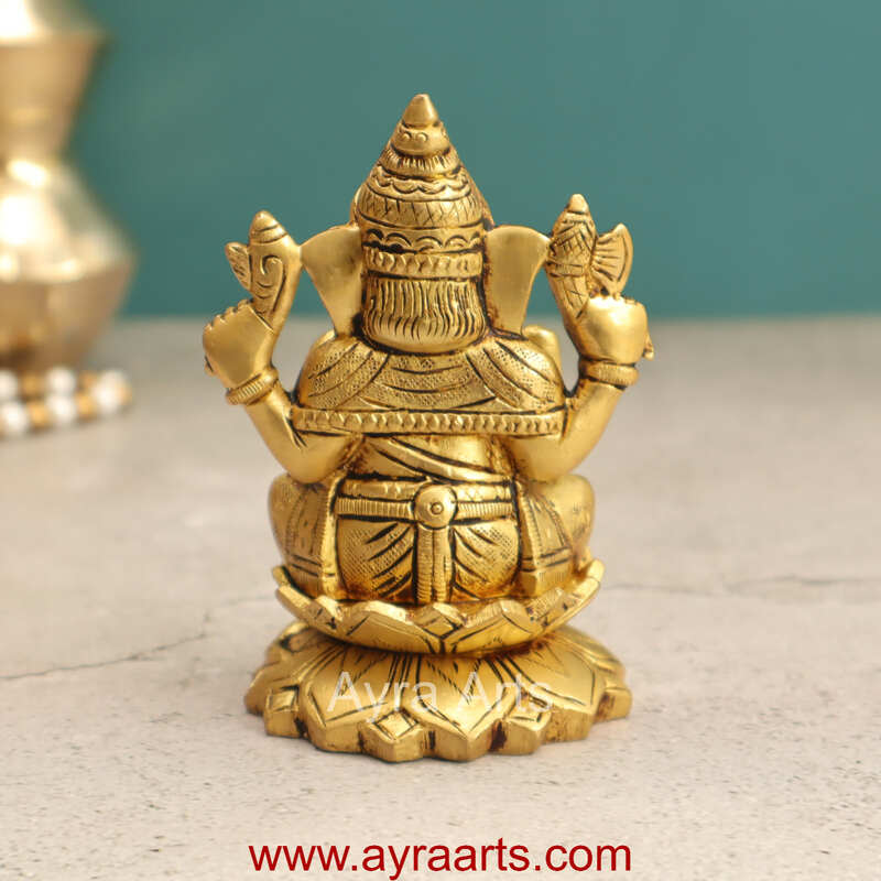Brass Fine Art Ganesha Sitting On Lotus Base - 4 Inch Height Brass Fine Art Ganesha Sitting On Lotus Base - 4 Inch Height