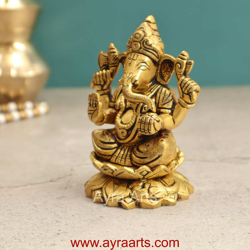 Brass Fine Art Ganesha Sitting On Lotus Base - 4 Inch Height Brass Fine Art Ganesha Sitting On Lotus Base - 4 Inch Height