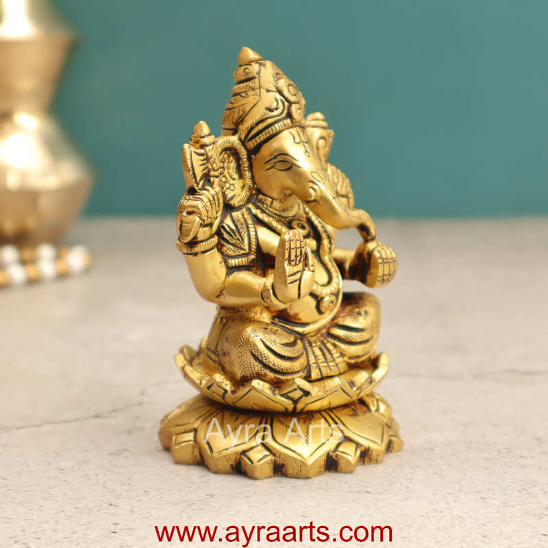 Brass Fine Art Ganesha Sitting On Lotus Base - 4 Inch Height Brass Fine Art Ganesha Sitting On Lotus Base - 4 Inch Height